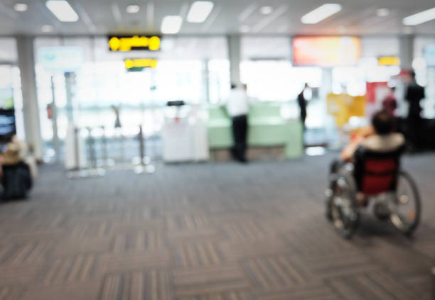 istock Blur image of modern airport hall interior with Passengers. 1078971830