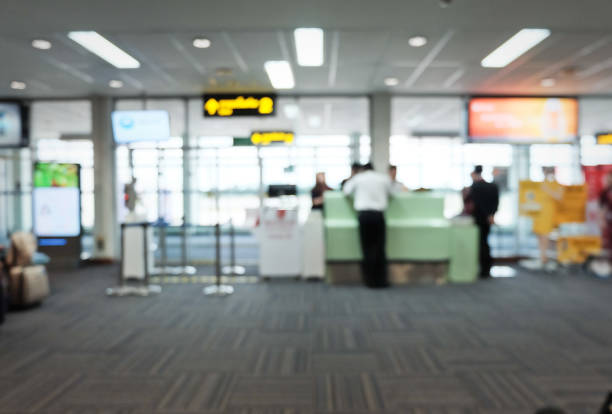 istock Blur image of modern airport hall interior with Passengers. 1078971872