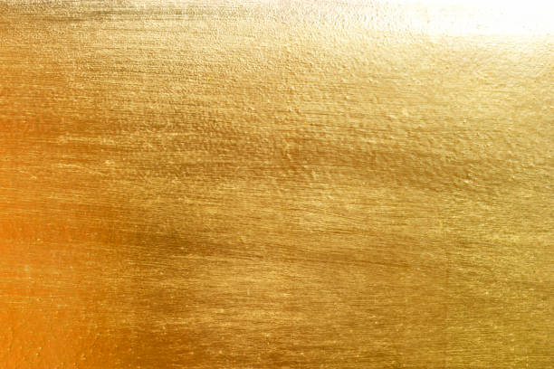 istock Shiny yellow leaf gold metall texture 1078976104