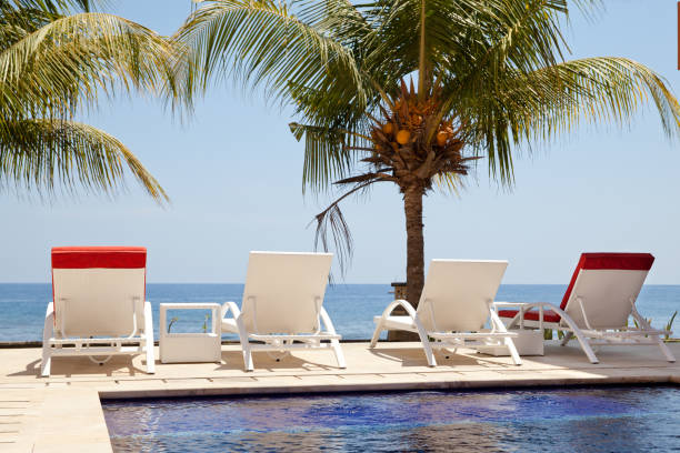 istock White sun loungers by the sea. 1078977826