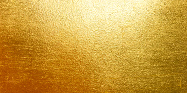 istock Shiny yellow leaf gold metall texture 1078985788