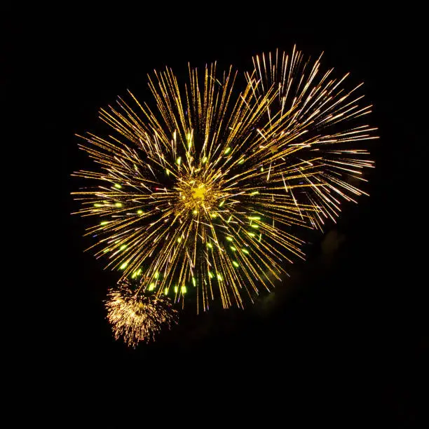 Photo of Bright fireworks isolated on black background