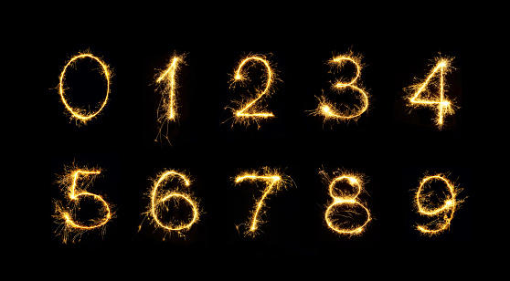 Beautiful set of Fireworks numbers 0, 1, 2, 3, 4, 5, 6, 7, 8, 9. Burning sparkler Numbers isolated on black background. Numbers of Sparklers to overlay on texture for design