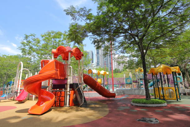 istock Child playing ground slider park 1078991146