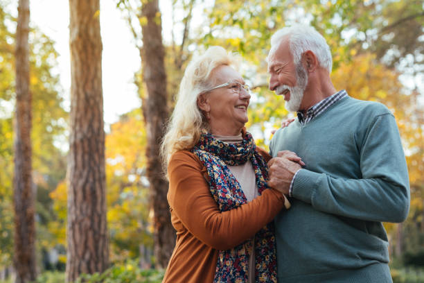 istock Senior couple taking a walk in the park 1078995292