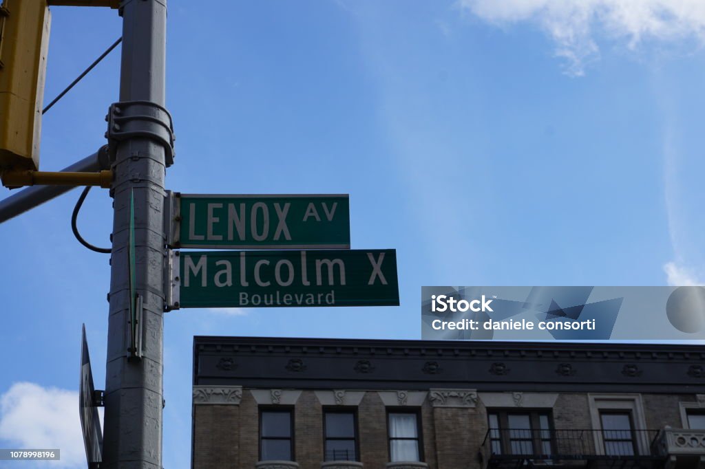 harlem street malcom x detail of the sign with street name in harlem, new york Harlem Stock Photo