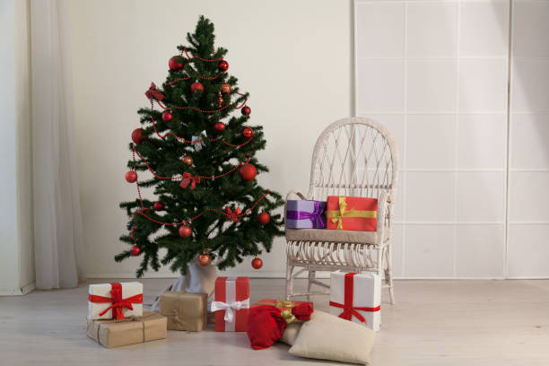istock Christmas tree new year gifts holiday card tree interiors 1079001440