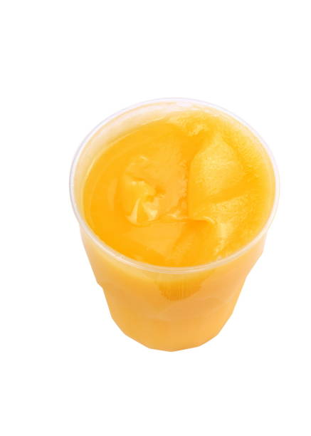 istock yellow honey in plastic figured container isolated on white background at dry sunny day 1079002222