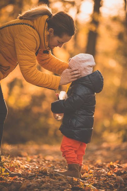 istock Mother taking care of daughter 1079002964