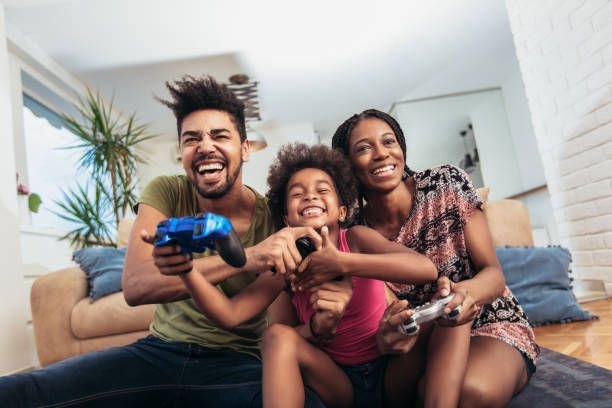 istock Family Playing Video Games Together 1079003248