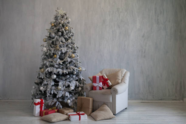 istock Christmas tree new year gifts holiday card tree interiors 1079003554