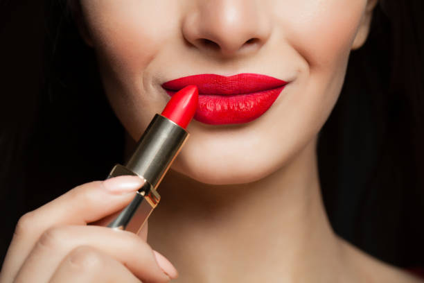 istock Red color lips, macro. Makeup and cosmetics concept 1079011146