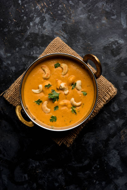 Cashew Curry / Indian kaju masala served in a bowl or pan. selective focus Cashew Curry / Indian kaju masala served in a bowl or pan. selective focus masala stock pictures, royalty-free photos & images