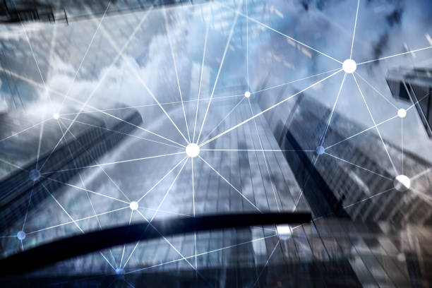 istock Blockchain network on blurred skyscrapers background. Financial technology and communication concept. 1079019292