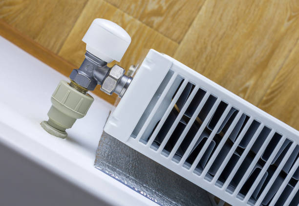 istock View from above of a heating radiator on the wall. Close-up, selective focus. 1079022732