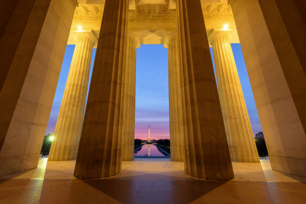 View of Washington Monument from Lincoln Memorial at Beautiful Sunrise, Washington DC View of Washington Monument from Lincoln Memorial at Sunrise, Washington DC lincoln memorial photos stock pictures, royalty-free photos & images