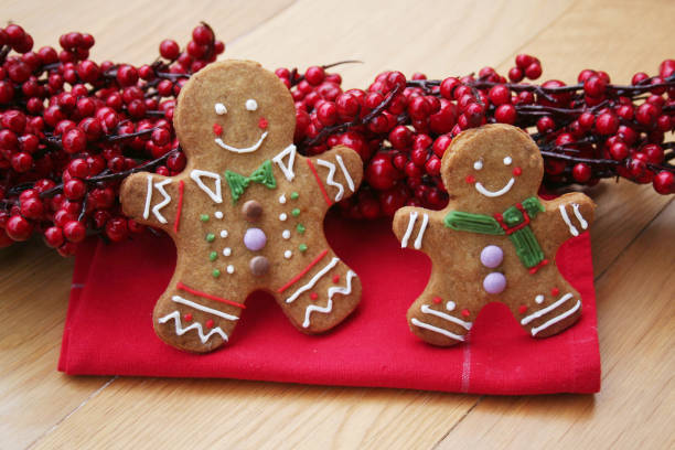 istock Gingerbread men cookies with red berry decoration 1079023700