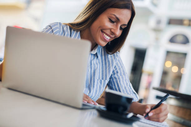 istock Female freelancer at cafe 1079024752