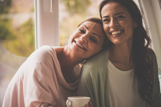 istock Woman leaning on friend's shoulder 1079028124