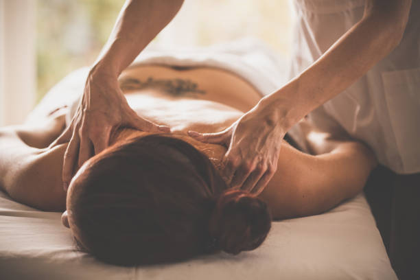 istock Woman receiving back massage at spa 1079031152