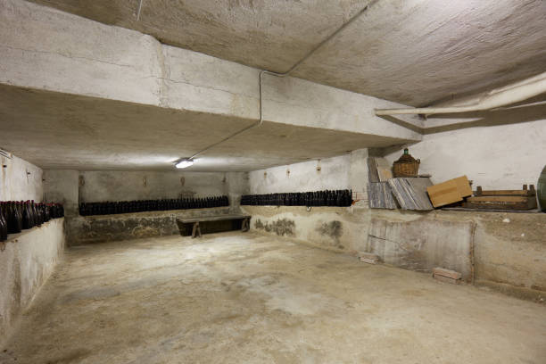 istock Basement with wine bottles in old house interior 1079043440