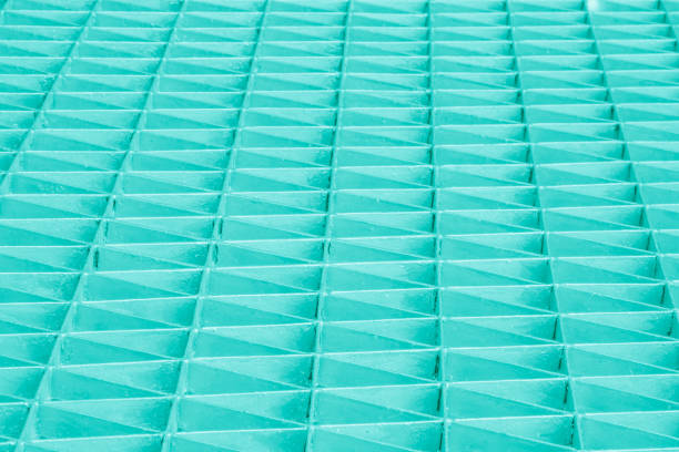 Pastel Blue Abstract metallic triangle or stainless steel texture black silver textured pattern background sheet of metal covered with lines of rolled steels.