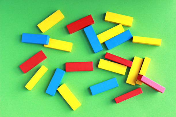 istock colorful toy blocks lying on a green background 1079050476