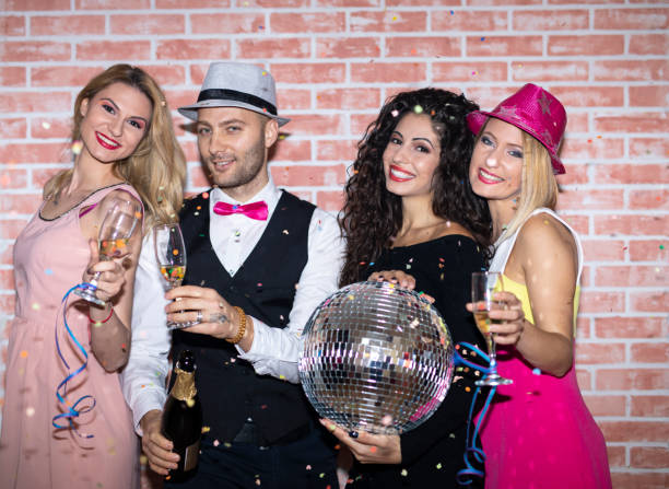 istock Group of friends having fun at party 1079056360