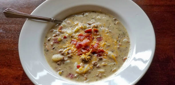 istock Hamburger soup with potatoes, cheese and bacon 1079059050