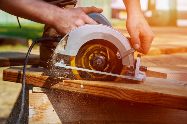 istock Circular Saw. Carpenter Using Circular Saw for wood beam 1079064142