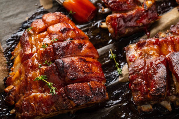 istock Grilled pork ribs on baking paper, top view. Copy space. 1079065778