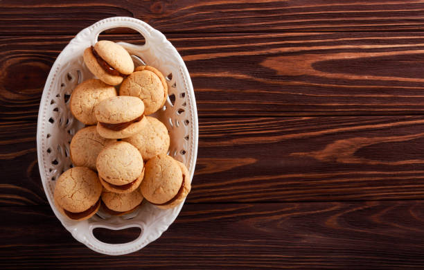 istock Women's kisses - almond sandwich biscuits 1079076842