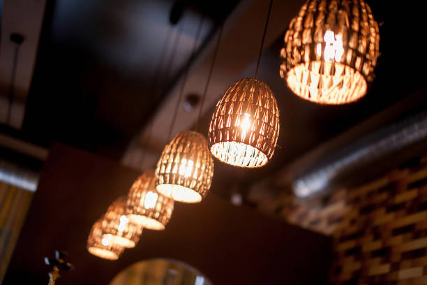 istock Warm lighting modern ceiling lamps in the cafe and interior decoration restaurant. 1079085854