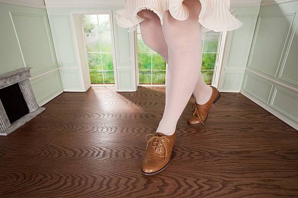 Legs of giant woman in tiny room  brogue photos stock pictures, royalty-free photos & images