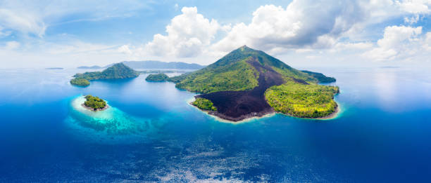 istock Aerial view Banda Islands Moluccas archipelago Indonesia, Pulau Gunung Api, lava flows, coral reef white sand beach. Top travel tourist destination, best diving snorkeling. 1079088090