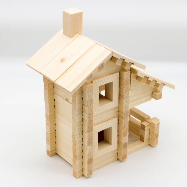 istock Wooden toy house on a white background 1079090008