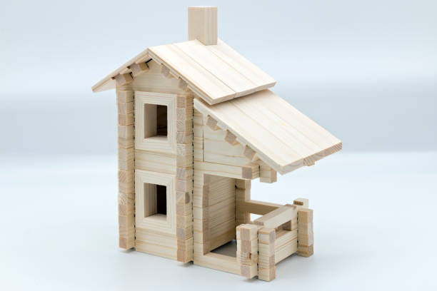istock Wooden toy house on a white background 1079090070