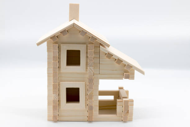 istock Wooden toy house on a white background 1079090074