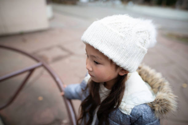 istock Girl playing in the park 1079095308