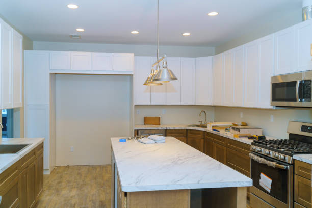 istock Blind cabinet, island drawers and counter cabinets installed 1079098238