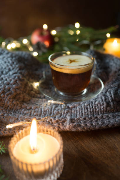 istock Christmas background with fir tree, tea cup and candles 1079100564