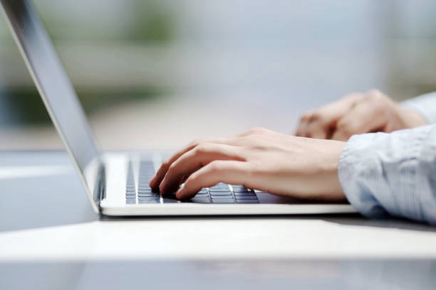 istock Businessman working laptop for new architectural project. Generic design notebook on the table. Young businessman working with laptop at office. Unrecognizable man using a modern portable computer 1079101236