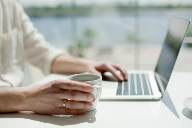 istock Businessman working laptop for new architectural project. Generic design notebook on the table. Young businessman working with laptop at office. Unrecognizable man using a modern portable computer 1079101256