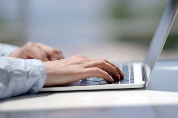 istock Businessman working laptop for new architectural project. Generic design notebook on the table. Young businessman working with laptop at office. Unrecognizable man using a modern portable computer 1079101306