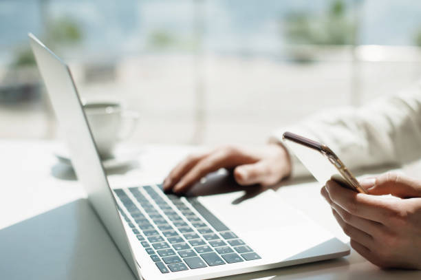 istock Businessman working laptop for new architectural project. Generic design notebook on the table. Young businessman working with laptop at office. Unrecognizable man using a modern portable computer 1079101328