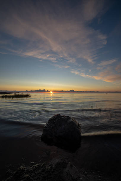 istock colorful sunset or sunrise in the sea 1079112098