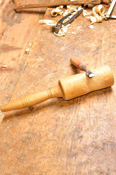 istock Carpenter working. Carpenter tools on wooden table with sawdust. Carpenter workplace 1079114440