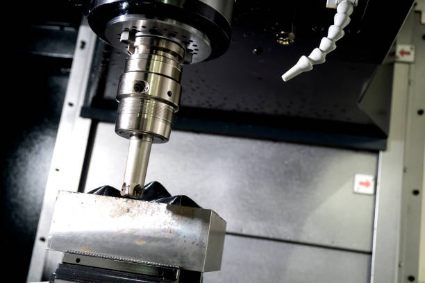 istock The  operation of CNC milling machine . 1079114542
