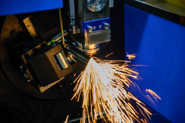 istock The CNC fiber laser cut machine cutting  the stainless pipe. 1079114644