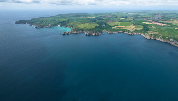 istock Aerial views over the coastline including Porthcurno. 1079128484